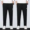 Pantalones casuales para hombre para otoño e invierno, pantalones deportivos tipo jogger de pierna recta, ajuste holgado, pantalones gruesos, versátiles para otoño