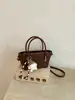 Bolso cruzado tejido de alta gama para mujer, nuevo modelo 2026, versátil para el día a día, bolso pequeño cruzado