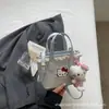 Bolso de Mano Pequeño con Adorno de Encaje Dulce para Mujer 2026 Nueva Moda Bolso Canasta Cubo Bolso Cruzado Versátil de Verano