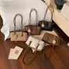 Bolsa Tote Feminina 2026 Nova Versátil Moda Simples Toque de Luxo Portátil de Ombro Bolsa Grande Capacidade