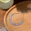 Pulsera de zirconita geométrica europea y americana con costuras de alta gama, simple, de cordón ajustable, nicho, exquisita, nueva joyería al por mayor
