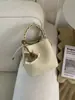Bolsa de Mano Cruzada Primavera y Verano Nuevo 2026 Coreana de Nicho Bolsa de Empanada Bolso Tejido Bolso Cubo con un Toque de Lujo y Diseño Exquisito Bolso Cruzado
