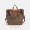 Bolsa de hombro grande de alta capacidad para mujer, nuevo modelo de verano 2026, bolso tote casual de color liso de nicho, bolso de mano para viaje