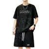 Camiseta de manga corta tie-dye con vibra americana para hombre, nueva marca de moda de verano, conjunto de dos piezas de moda juvenil estilo dirty con pantalones cortos