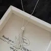 Collar con Colgante de Saturno de Circonita Estilo Fresco de Temperamento Nicho Cadena para Suéter Versátil Casual Cotidiano Fabricante de Fábrica