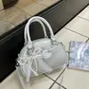 Bolsa de Mão Estilo Bowling Coreana de Nicho para Mulheres 2026 Novo Modelo Versátil Texturizada Ombro Transversal Bolsa Quadrada Pequena para o Dia a Dia