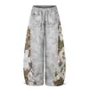Marca de Moda Retro Americana Pantalones Curvos Estampado de Leopardo Camuflaje con Diseño Único de Tachuelas, Corte Holgado, Pantalones de Pierna Ancha con Caída