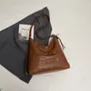 Bolsa de ombro única de cor sólida com nova textura transfronteiriça, bolsa de axila, mochila de grande capacidade moderna, bolsa tote alta e estilosa