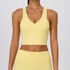 Camiseta de yoga sin costuras transfronteriza con almohadillas en el pecho para mujer, cuello en V, diseño de espalda cruzada, prenda exterior transpirable para deportes al aire libre y fitness