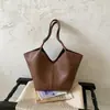 Bolsa Tote Grande Capacidade para Comutação Transfronteiriça Feminina 2026 Novo Estilo Tendência Versátil Moda Diária Simples Bolsa de Ombro Bolsa de Braço