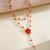 Collar multicapa de flor de resina estilo europeo y americano con gotas de aceite y diamantes, cadena de clavícula de dopamina personalizada, pulsera y collar de alta gama