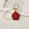 Chaveiro Pingente Criativo Moda Couro Strass Camélia Pérola Contas Chaveiro Pingente Personalidade Charme de Bolsa