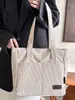 Otoño 2026 Nuevo Lona Gran Capacidad Moderno Alta Apariencia Color Sólido Moda Sensación Relajada Bolso Tote para Trabajar y Viajar