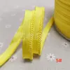 En stock 48 colores poliéster velcro con borde de cordón ribeteado tira de inserción de cuerda para ropa colchas sofás cojines tira de ribete
