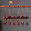 Palo de Rosa Doce Campanas del Zodiaco Accesorios Cadena para Colgar Teléfono Móvil Yiming Xianyuan Campana de Viento Creativa Adornos Colgantes