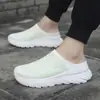Zapatillas casuales de punto transpirable sin cordones transfronterizas para parejas, zapatos de moda streetwear para hombres y mujeres al por mayor