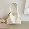 Bolsa de mão de cor sólida para mulheres, estilo coreano, chique sem esforço, coleção de outono 2026, bolsa de ombro, bolsa tote com design estiloso