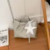 Bolso de cubo tejido de nicho transfronterizo 2026 nuevo bolso de cesta de moda para mujer bolso de mano simple para hombro cruzado