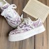 Baikuang 2023 Primavera e Verão Explosões Pequena Fragrância Fada Sapatos Nicho Design Retro Biqueira Redonda Sapatos de Lona Sapatos Brancos