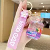 Chaveiro Copo de Chá com Leite Iceberg Colorido Transfronteiriço Pingente de Bolsa para Casal Anel de Chaveiro Exquisito com Areia Movediça Líquida
