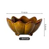 Elegante y sencillo plato de cerámica con forma de loto para casas de té, con nueces, frutas secas y bocadillos; adecuado para uso comercial en salones de té y salas de estar