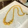 Tienda de oro mismo estilo arena oro ojo de gato redondo cepillado cuenta collar clásico moderno retro nicho diseño alta gama sensación cadena de clavícula