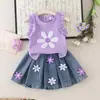 Ropa transfronteriza europea y americana para bebés y niños: conjunto nuevo de top sin mangas floral de verano y shorts de mezclilla con estampado retro, al por mayor