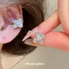 Clip para oreja de flor de circón bañado en oro real de 18k, no requiere perforación, sensación de lujo ligero de alta gama, clip para cartílago de la oreja, aretes de diseño nicho