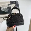 Nova Coleção Outono/Inverno 2026: Bolsa tipo concha da moda com lantejoulas brilhantes, bolsa transversal feminina, item popular de comércio exterior, bolsa de ombro