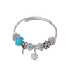 Pulsera simple de acero inoxidable europea y americana nota hueca aleación con cuentas DIY colgante de corona Pulsera de dama