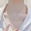 Nuevo Acero de Titanio Diseño de Nicho Transfronterizo No se Desvanece Lindo Colgante de Lazo Hueco Collar Cadena para Clavícula para Mujer Joyería