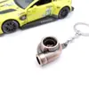 Regalos creativos de explosivos transfronterizos cadena para colgar llavero metálico modificado para coche con turbocompresor llavero cadena de soplador