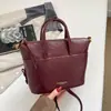 Tendencia Transfronteriza Estilo Coreano Bolso Pequeño Cuadrado de Mano para Mujer Bolso 2026 Otoño Nueva Llegada Color Sólido Bolso de Hombro Simple Bolso Cruzado para Viajes