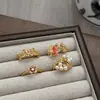 Anel Aberto Dourado Esmaltado Estilo Chinês Retrô Borboleta Flor Folha de Bordo Contas de Concha Recortado Esculpido Acessível Luxo Doce para Mulheres