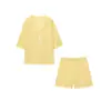 Fornecimento Transfronteiriço 2025 Novo Verão Feminino Casual Solto Simples Gola Lapela Tricô Vazado Manga Curta Conjunto de Shorts