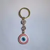 Colgante de Serie Ojo de Diablo Transfronterizo Europeo y Americano Colgante de Llavero de Joyería de Animales Ojo de Hueso con Goteo de Aceite Accesorios de Aleación para Mujeres