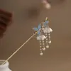 Novo prendedor de cabelo com borla estilo chinês para mulheres, estilo antigo, metal de alta qualidade, para coque de magnólia, estilo nacional, franja fria, cheongsam, balanço de passo
