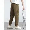 Pantalones cónicos elásticos de seda helada con sensación fresca para hombre, rebajas, novedad verano 2025, tejido gofrado, color liso, adelgazantes, de nueve puntos