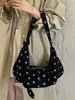 Bolso de lunares de nicho súper popular para mujer, nuevo bolso cruzado de moda 2026, exquisito bolso de hombro para axila, bolso de cuerno