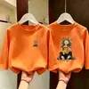 Camiseta de manga larga de dibujos animados a la moda estilo coreano para niñas, nuevo estilo primavera y otoño 2026, camiseta básica de algodón puro para niñas