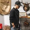 Camisa Jerenou retro com gola alta masculina manga longa outono 2026 nova tendência solta casual preta masculina