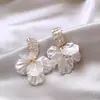 Pendientes de cobre Aguja de Plata con microincrustaciones de circonita y pétalos rojos, diseño femenino, moda, temperamento, flor de año de nacimiento de celebridad de internet