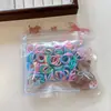 Lindo set de goma para el cabello de colores gruesas y desechables para bebés, empaquetado en bolsa de dibujos animados, que no dañan el cabello, directo del fabricante