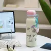 Botella de agua térmica Snoopy de acero inoxidable 316, diseñada para niñas, con un aspecto elegante, perfecta para que los estudiantes la usen en la escuela, cuenta con un asa para transportarla fácilmente y una tapa de tipo pop-up
