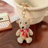 Novo Exclusivo Pingente de Urso com Laço de Diamante Coreano Chaveiro de Metal Chaveiro de Carro Enfeites para Pendurar na Bolsa