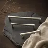 Liga de zinco cor níquel escovado gota d'água puxador de porta de guarda-roupa moderno fosco simples furo único puxador de gaveta armário armário de vinho