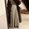 Falda de punto de longitud media para mujer, nueva colección otoño/invierno 2026, con un estilo coreano fluido y casual, cintura alta y una silueta amplia en A.