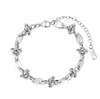 Pulsera de cadena de acero inoxidable chapada en oro de 18k transfronteriza, pulsera de diseño de nicho estilo INS, joyería de acero de titanio de alta gama que no se decolora