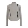 Puro y seductor, nuevo estilo coreano de primavera para chica popular, top de dos piezas: camiseta sin mangas de cuello alto ajustada a la cintura y cárdigan de manga larga