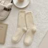 Calcetines de terciopelo de visón para mujer otoño e invierno nuevos calcetines de tubo cálidos de felpa de alta calidad calcetines de luna forrados de vellón calcetines para dormir de señora
